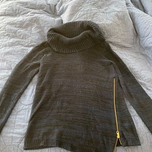 Blue sweater with gold zipper detail